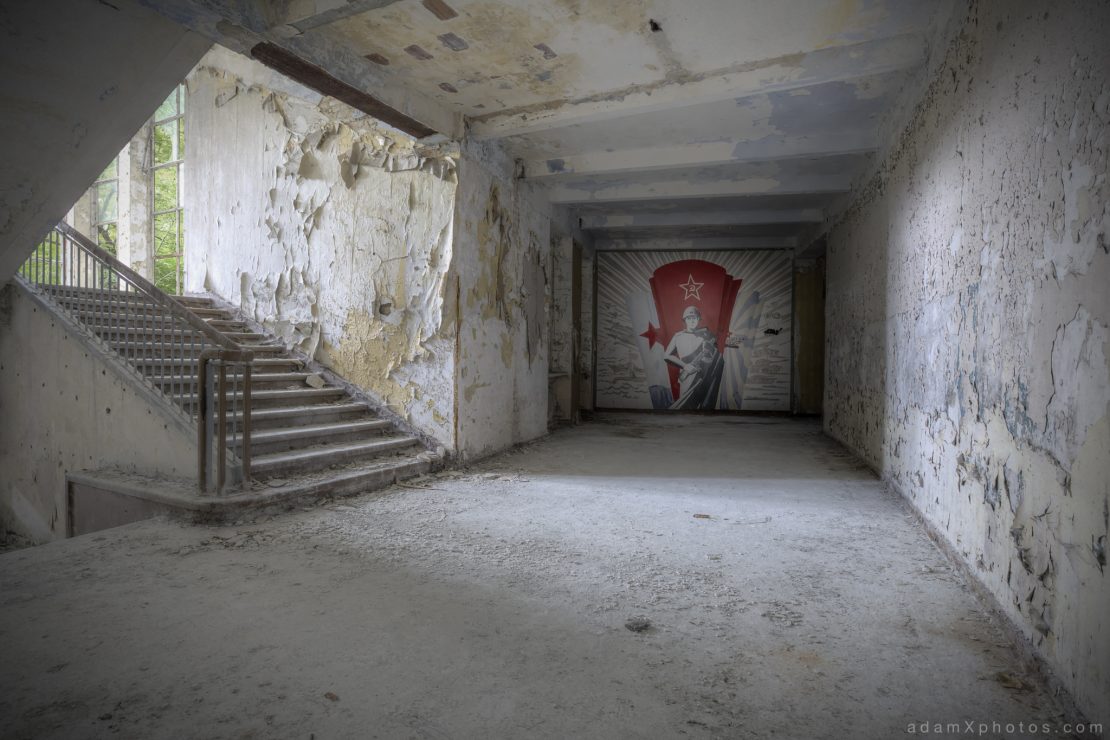 Adam X Urbex Altes Lager Juterbog Germany Urban Exploration Air base flight school CCCP Soviet Russian military Decay Lost Abandoned Derelict Hidden mural soldier wall painting picture photography corridor