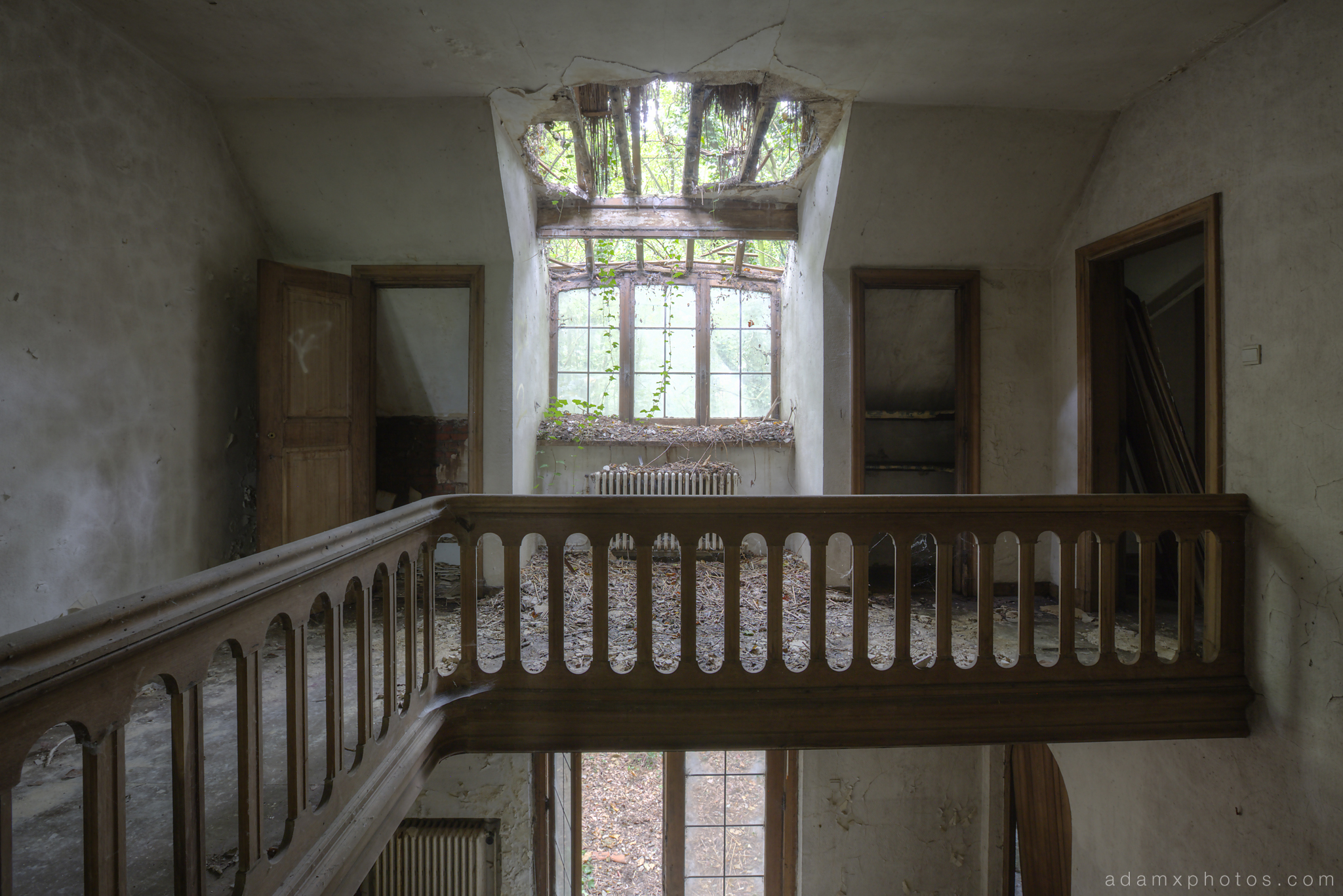 Upstairs landing bannisters roof windows hole Adam X Urbex UE Urban Exploration Belgium Villa Maison SS House Townhouse abandoned derelict unused empty disused decay decayed decaying grimy grime collapsing overgrown