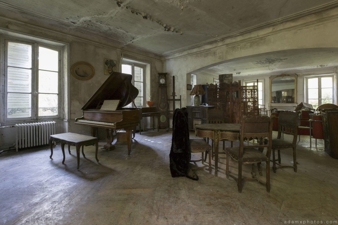 Baby Grand Piano chairs retro antique grandfather clock living room dining room Chateau Cacophonie Manoir Musique Music was my first love France Urbex Adam X Urban Exploration 2015 Abandoned decay lost forgotten derelict
