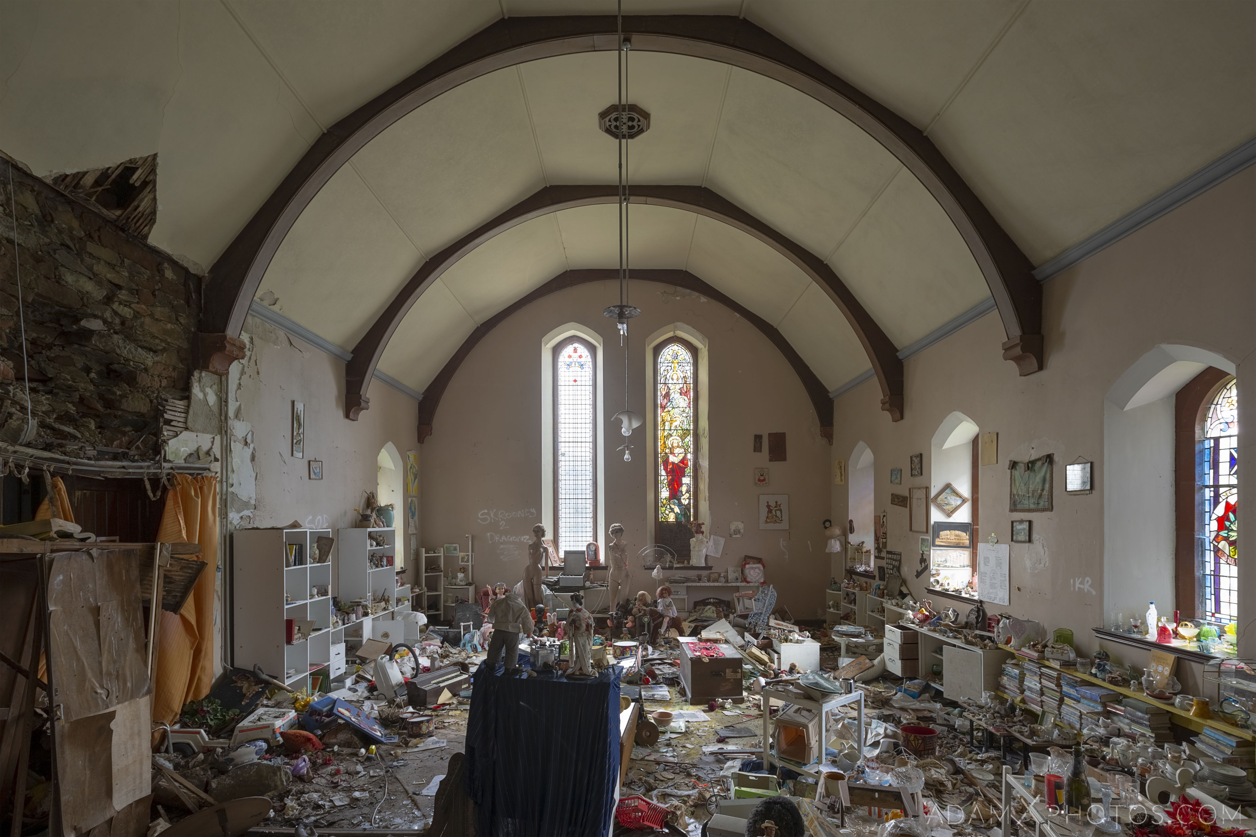 Main Hall soft toys ornaments books stained glass windows Elvanfoot Parish Church Hoarder Hoarders Church Adam X Urbex Urban Exploration Access 2018 Abandoned decay lost forgotten derelict location creepy haunting eerie