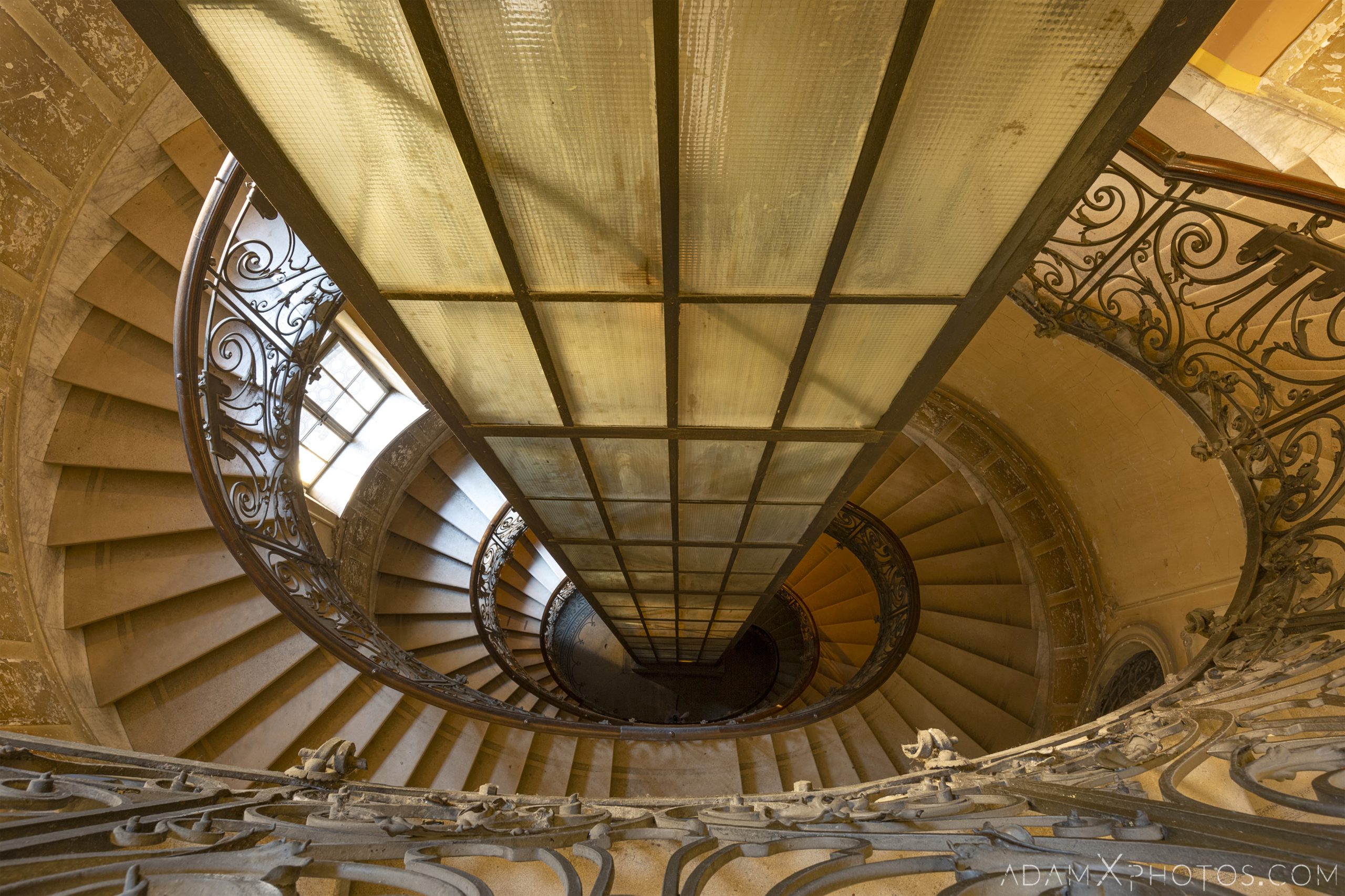 spiral staircase looking down lift Adria Palace Budapest Hungary Adam X Urbex Urban Exploration Access 2018 Blade Runner 2049 Abandoned decay ruins lost forgotten derelict location creepy haunting eerie security ornate grand neo baroque