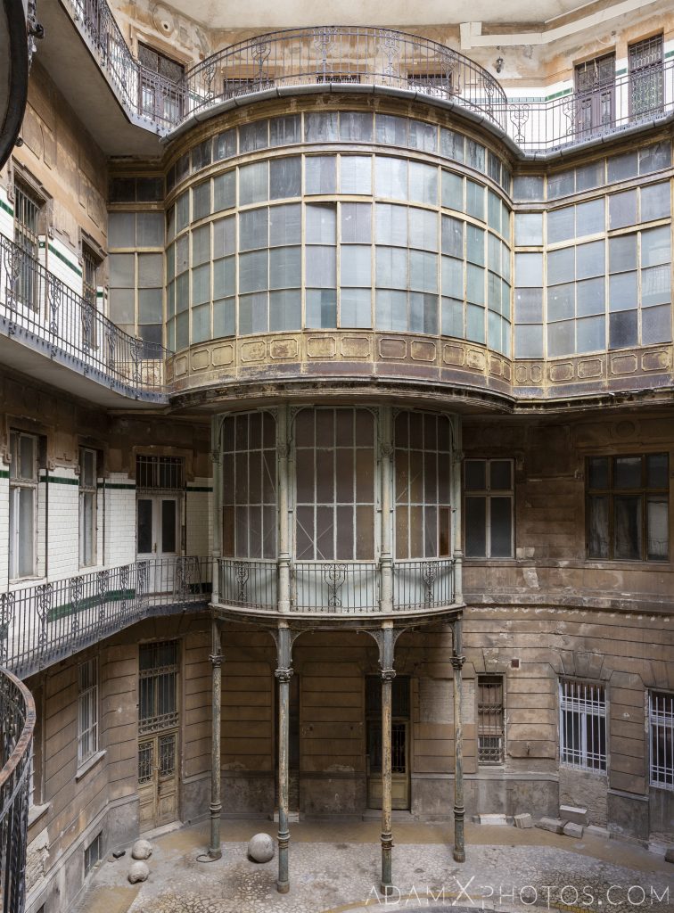 exterior outside railings Curved walkway balcony windows courtyard Adria Palace Budapest Hungary Adam X Urbex Urban Exploration Access 2018 Blade Runner 2049 Abandoned decay ruins lost forgotten derelict location creepy haunting eerie security ornate grand neo baroque
