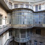 exterior outside railings Curved walkway balcony windows courtyard Adria Palace Budapest Hungary Adam X Urbex Urban Exploration Access 2018 Blade Runner 2049 Abandoned decay ruins lost forgotten derelict location creepy haunting eerie security ornate grand neo baroque
